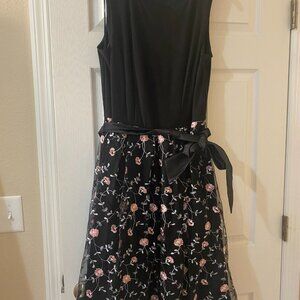 Black dress with embroidered flower skirt by Leslie Fay